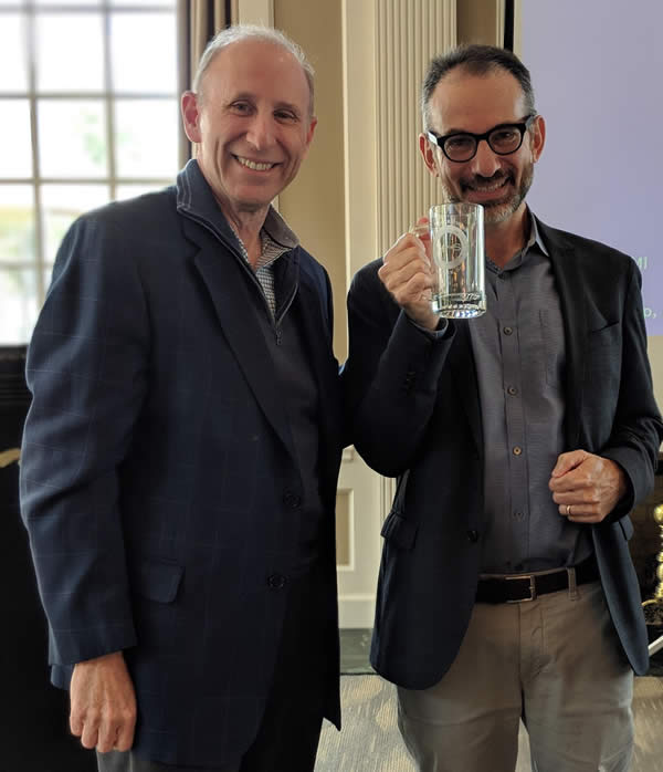 Dr. Jerome Blackman presented the honorary VPsaS mug to Dr. Nathan Kravis at the October 2018 meeting